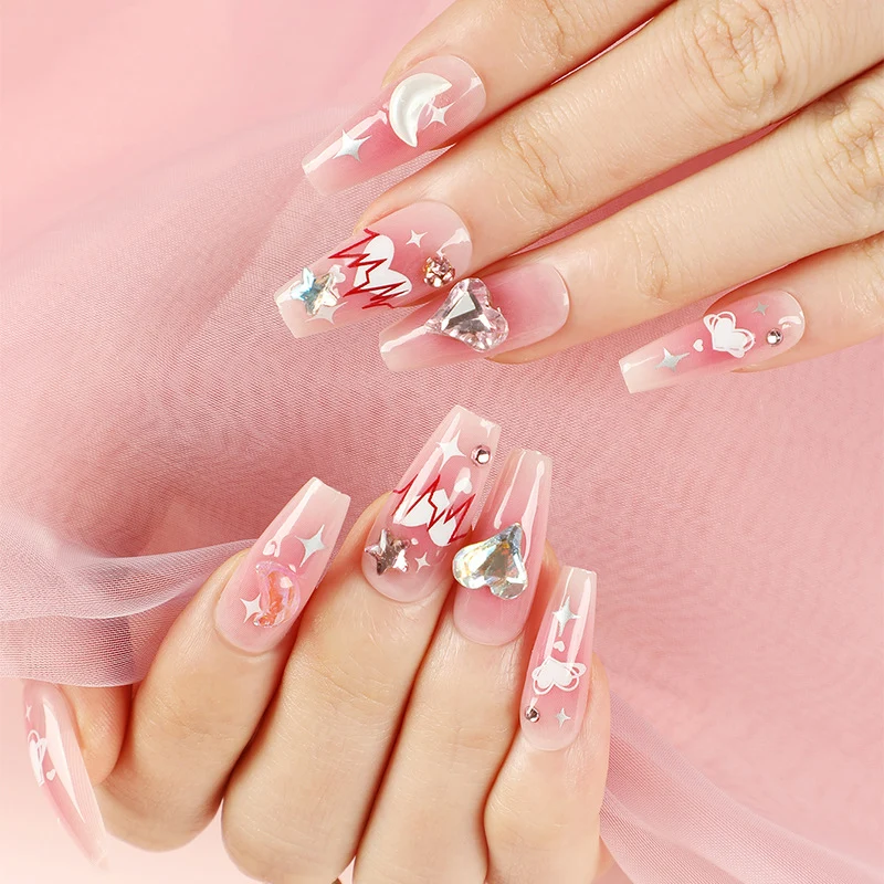 Kunstvolle Gel-Nägel mit Glamourösen Verzierungen Karnz