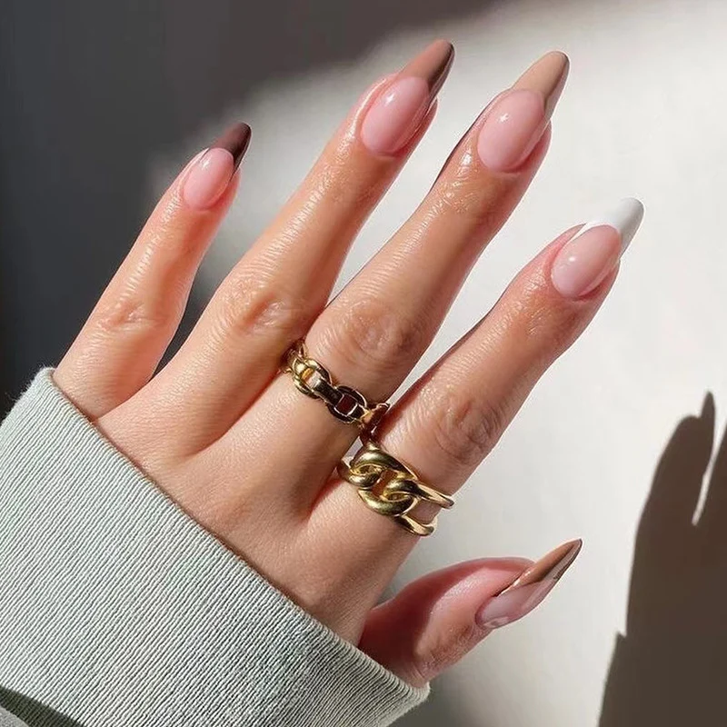 Kunstvolle Gel-Nägel mit elegantem Farbverlauf und modischem Akzent Karnz
