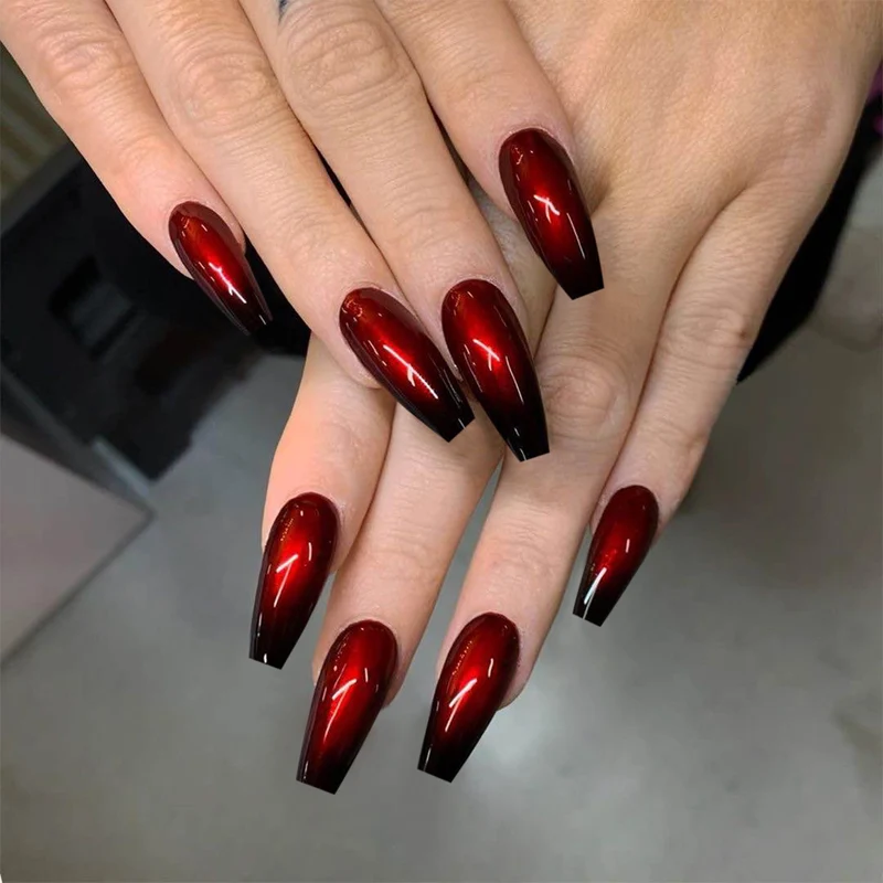 Künstliche Nagelkunst im eleganten Stiletto-Design mit glänzenden Farbverlauf Karnz