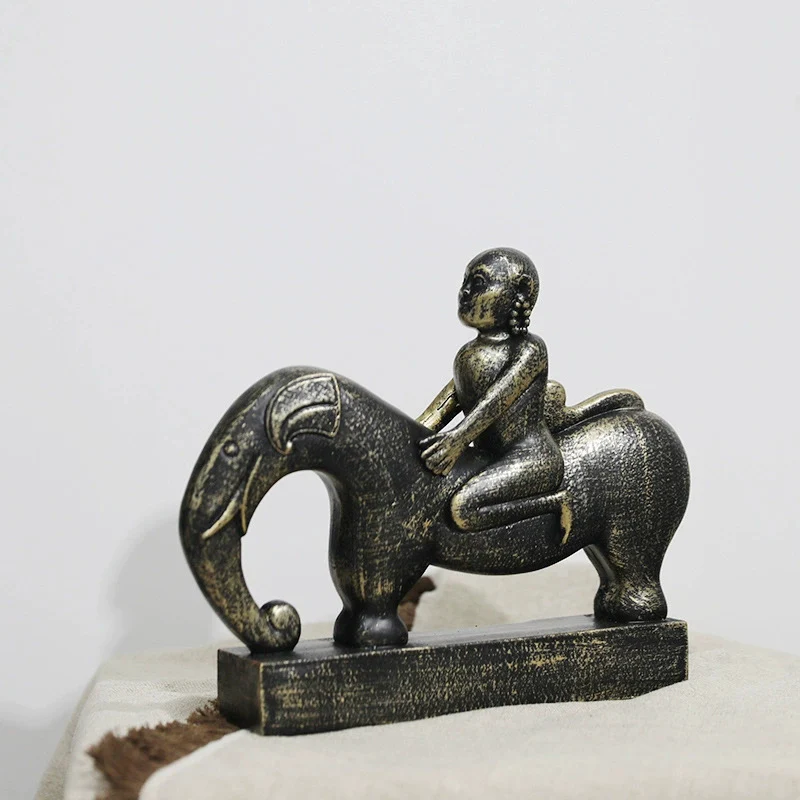 Verspielte Elefant-und-Kind-Skulptur