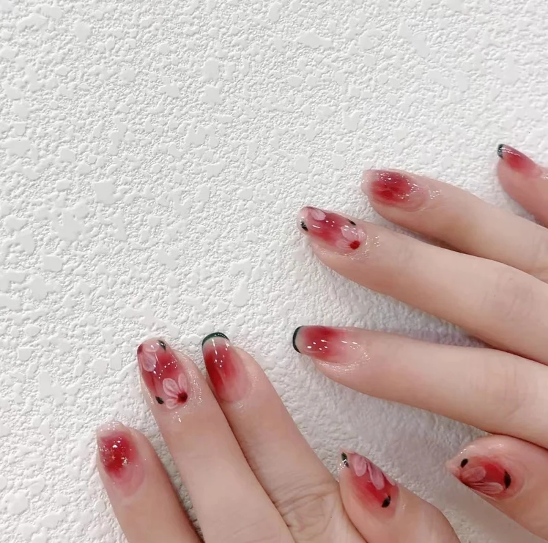 Künstlerische von Sakura inspirierte Press-On Nägel Karnz