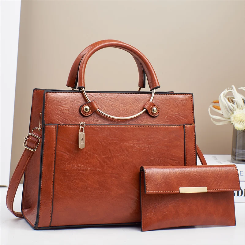 Elegante Handtasche mit Abnehmbaren Schulterriemen und Passendem Geldbeutel Karnz