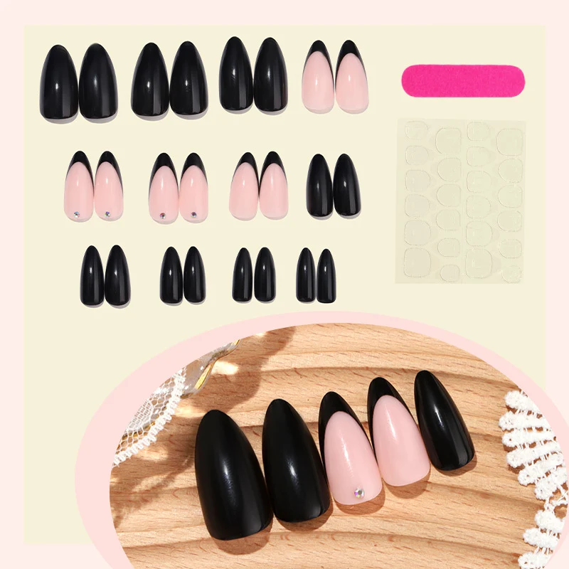 Kunstnagelset mit elegantem Schwarz-Pink Design und strassbesetzten Akzenten Karnz