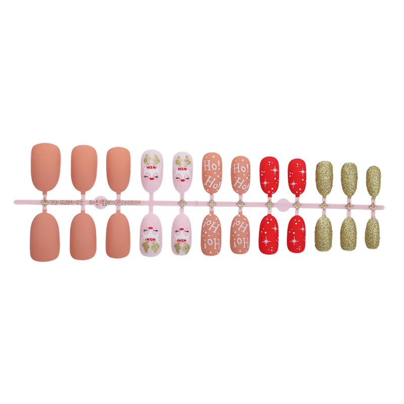 Kreatives Kunstnagelset mit festlichen Motiven Karnz