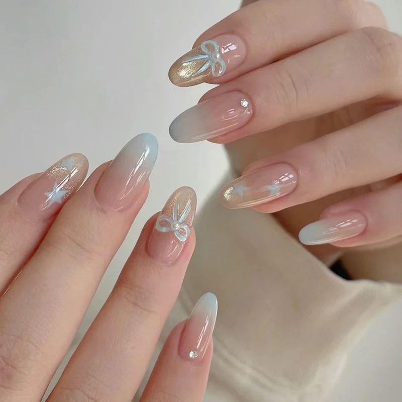 Ombre Nail Art Press-On Set mit dekorativem Bogen und Sternelementen Karnz