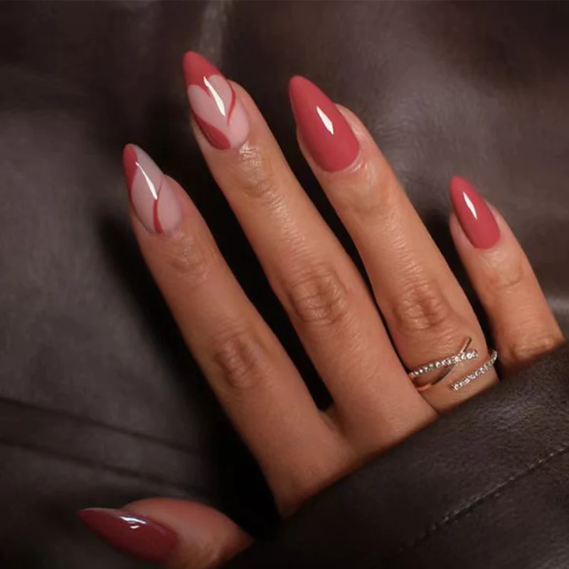 Elegante Stiletto Press-On Nägel mit künstlerischem Grafikdesign Karnz