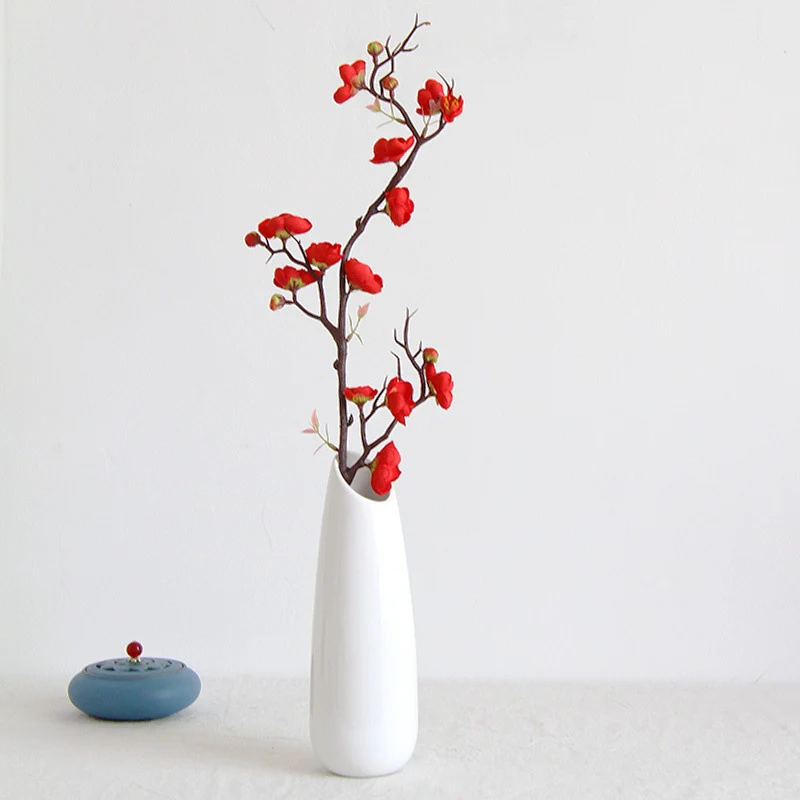 Dekorative florale Zweigarrangement