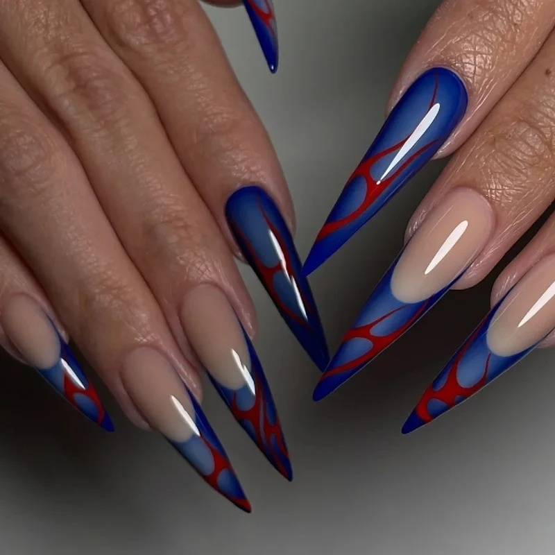 Kunstvolle Stiletto-Nägel mit farbenfrohen Designs und kreativen Akzenten Karnz