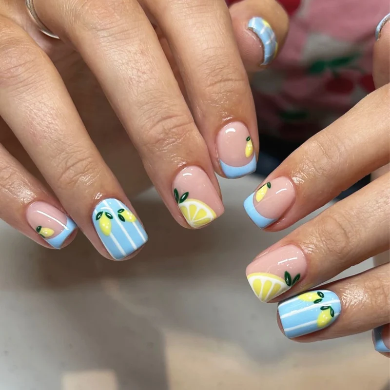 Kunstvolle Nagelkunst mit fruchtigem Zitronen-Design Karnz