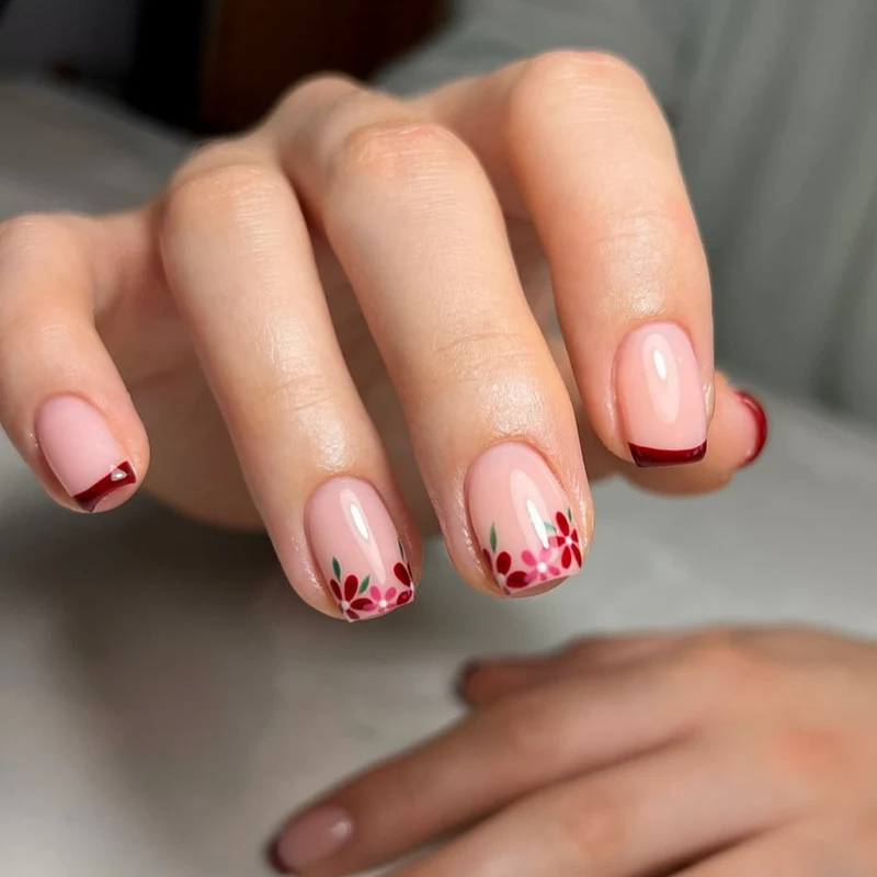 Kunstvolle Nagelgestaltung mit Blumen- und Farbverlaufseffekten Karnz