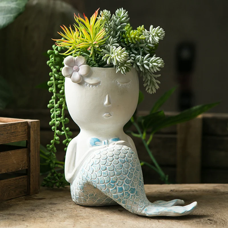 Künstlerische Blumengefäße Karnz