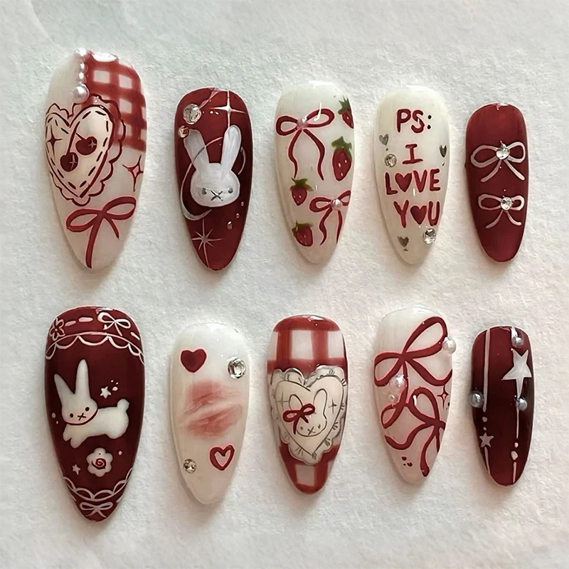 Kunstnagelset mit niedlichen Hasen- und Herzmotiven Karnz