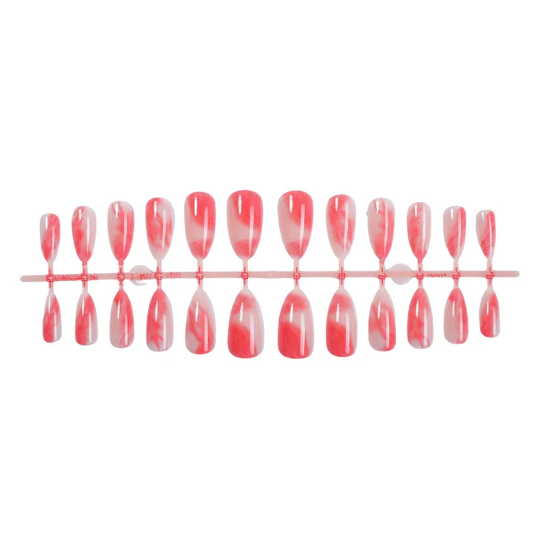Kunstnagelset mit marmoriertem Design Karnz
