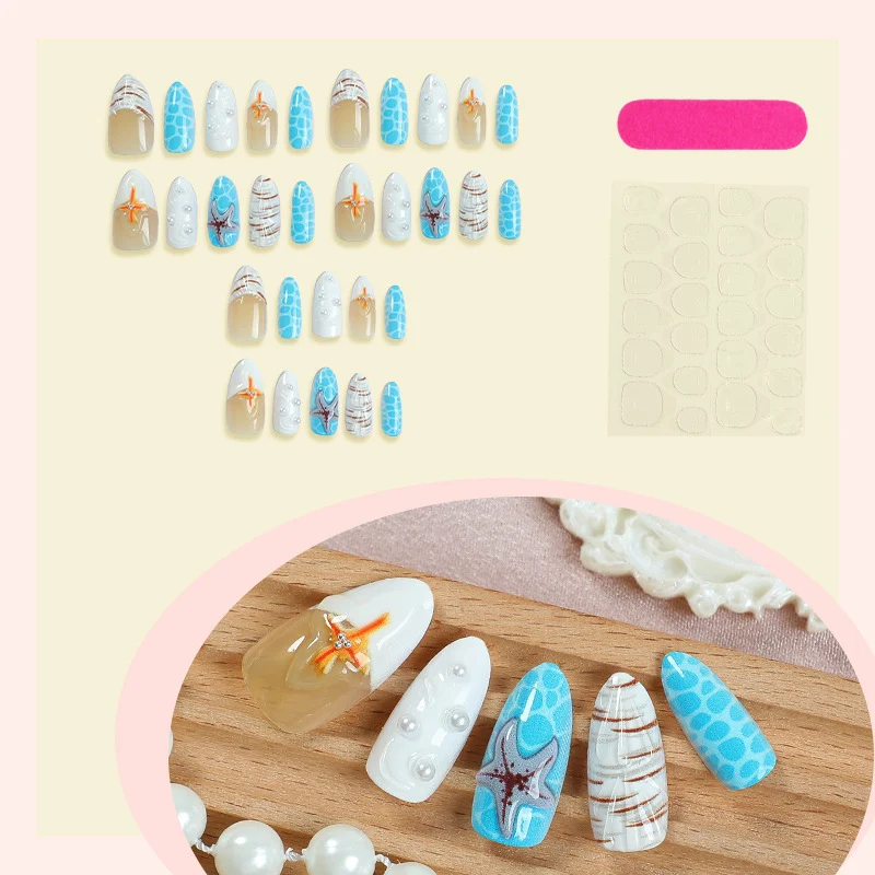 Kunstnagelset mit maritimem Design und verspielten Akzenten Karnz