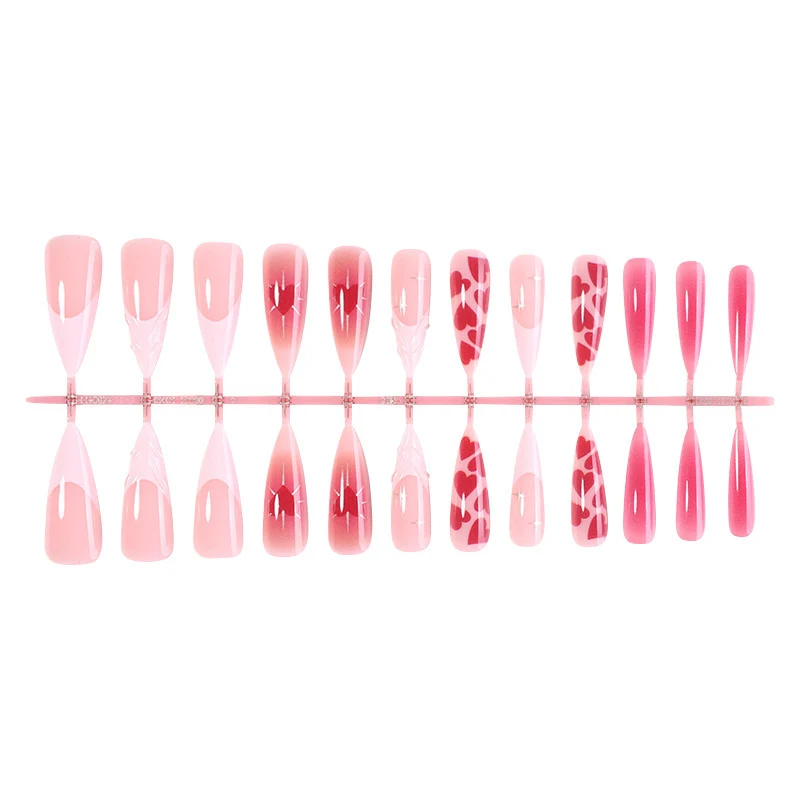 Kunstnagelset mit luxuriösem Ombre-Design und kreativen Herzmotiven Karnz