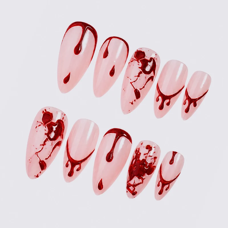 Kunstnagelset mit kreativen Blutfleck-Designs Karnz