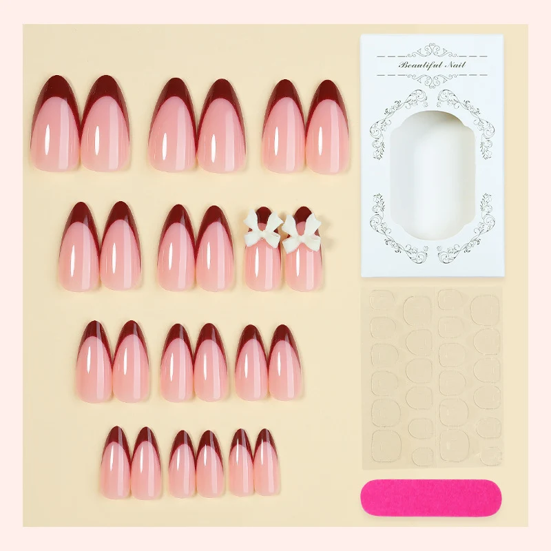 Kunstnagelset mit kreativem French-Tip Design und niedlichen Schleifen Karnz