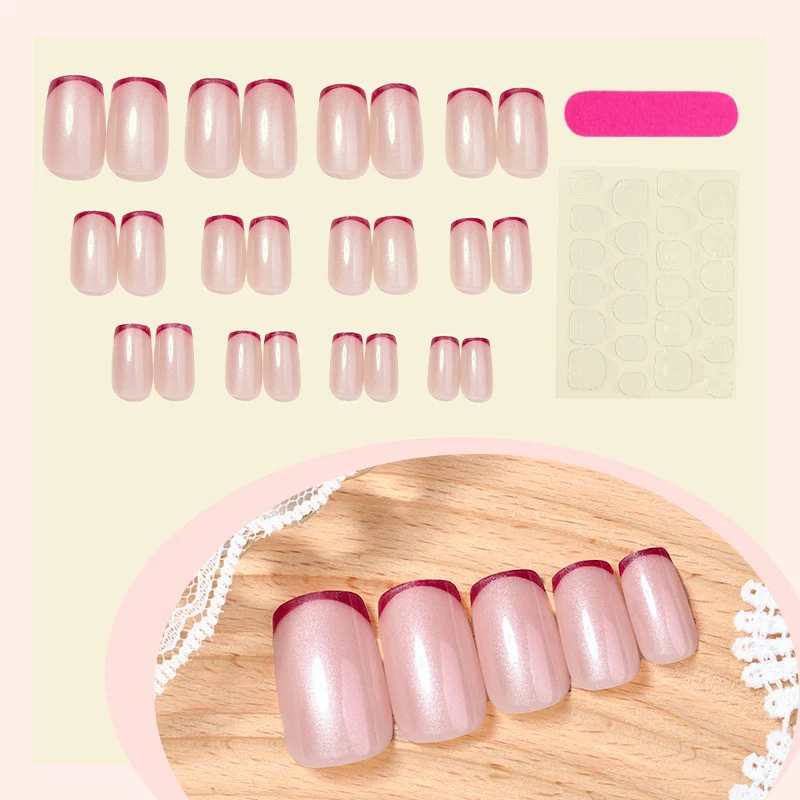 Kunstnagelset mit glamourösem French-Tip-Design Karnz