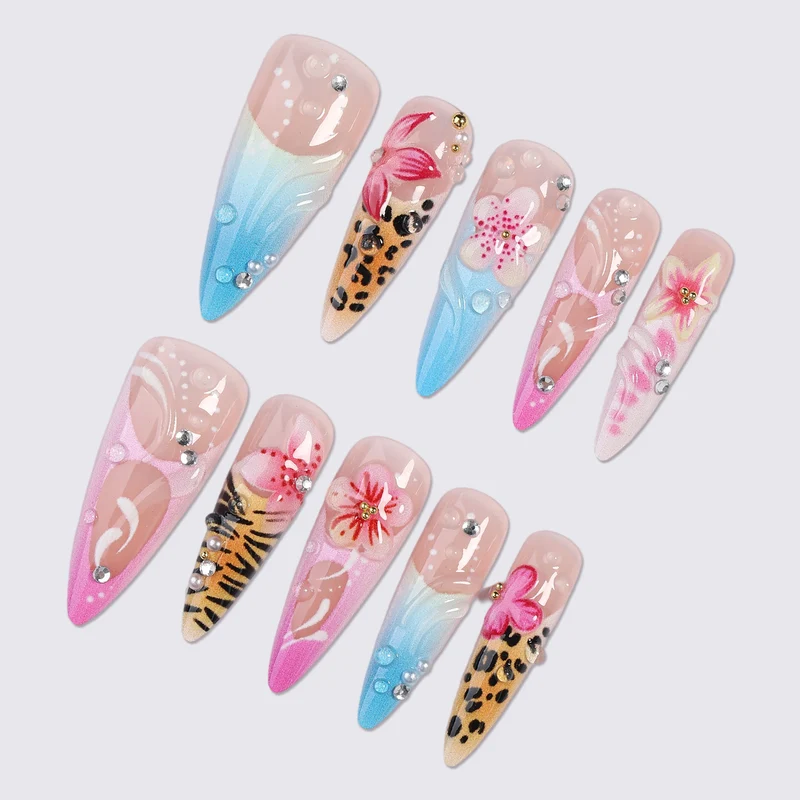 Kunstnagelset mit floralen und tierischen Designs Karnz