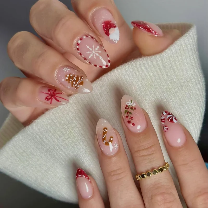 Kunstnagelset mit festlichen Motiven und Glitzerakzenten Karnz