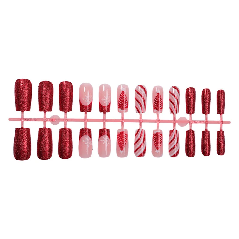 Kunstnagelset mit festlichen Glitzer- und Weihnachtsmotiven Karnz