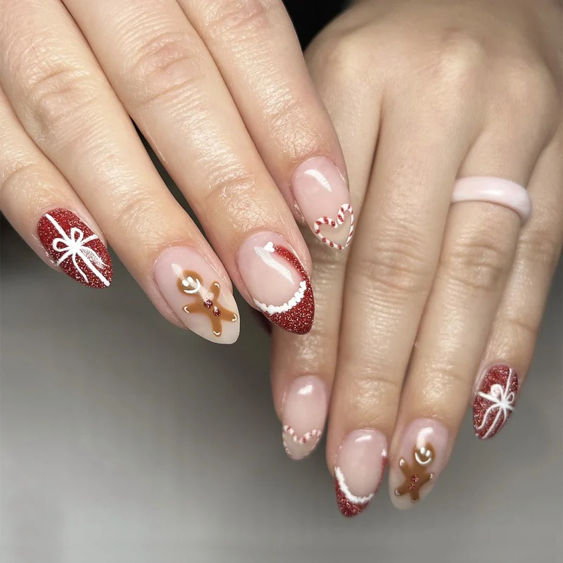 Kunstnagelset mit festlichem Zuckerstangen- und Lebkuchenmuster Karnz