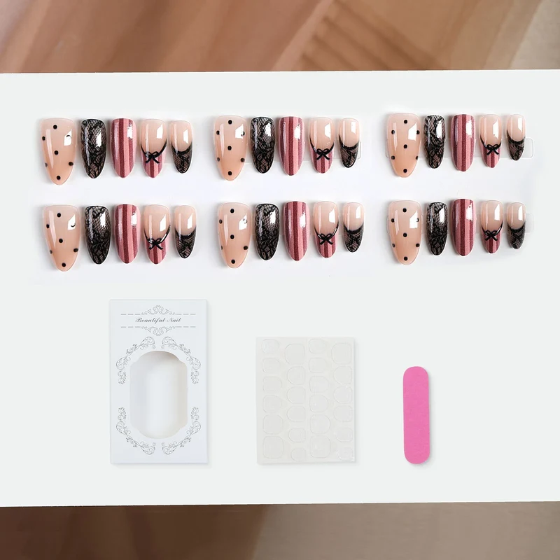 Kunstnagelset mit eleganten Schleifen- und Spitzenakzenten Karnz