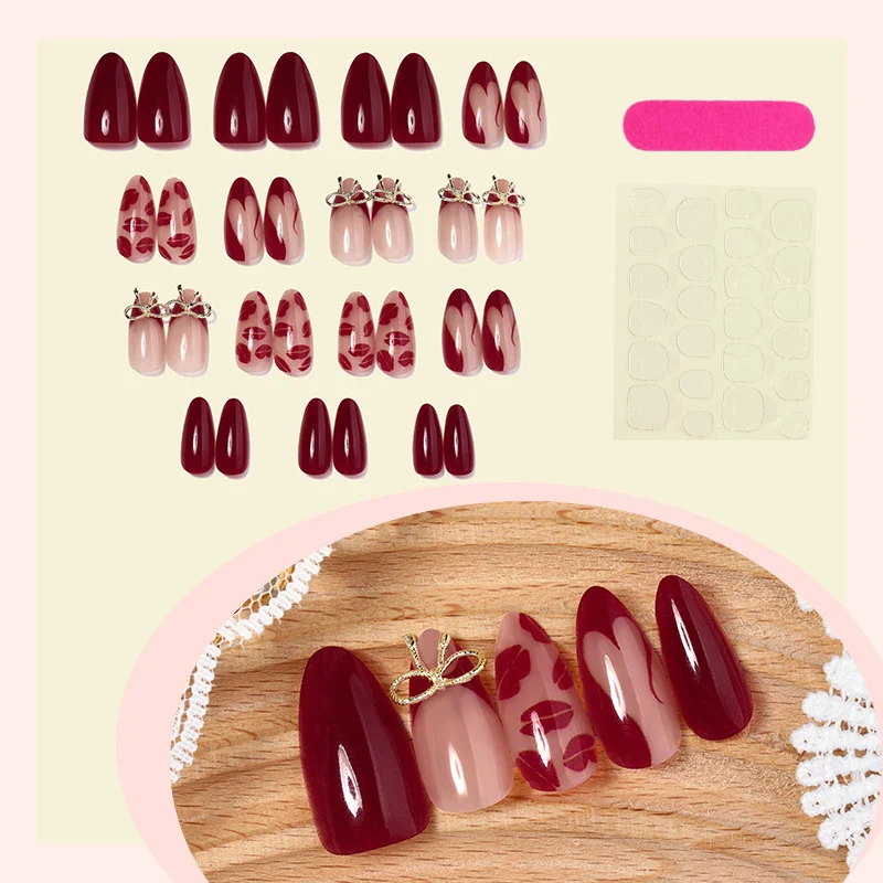Kunstnagelset mit eleganten Schleifen- und Lippenmotiven Karnz