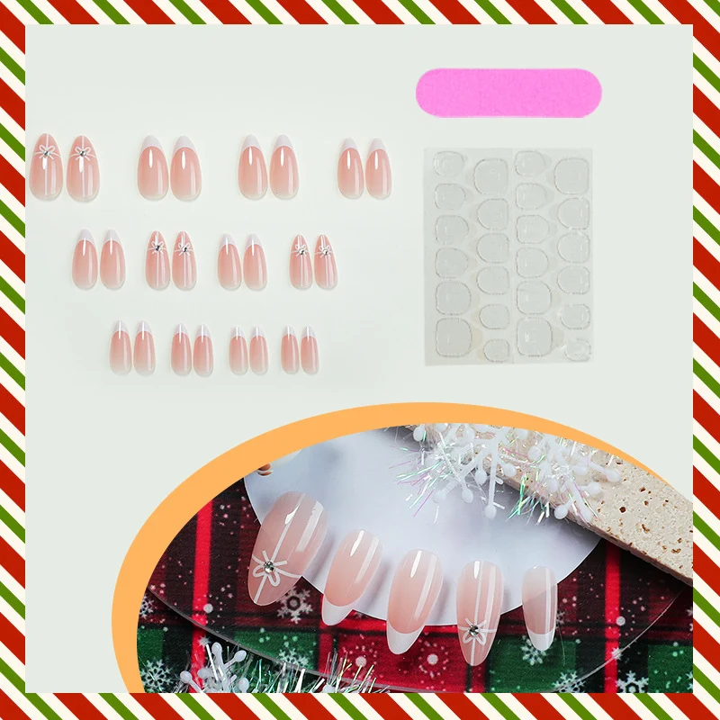Kunstnagelset mit eleganten Schleifen- und Glitzerverzierungen Karnz