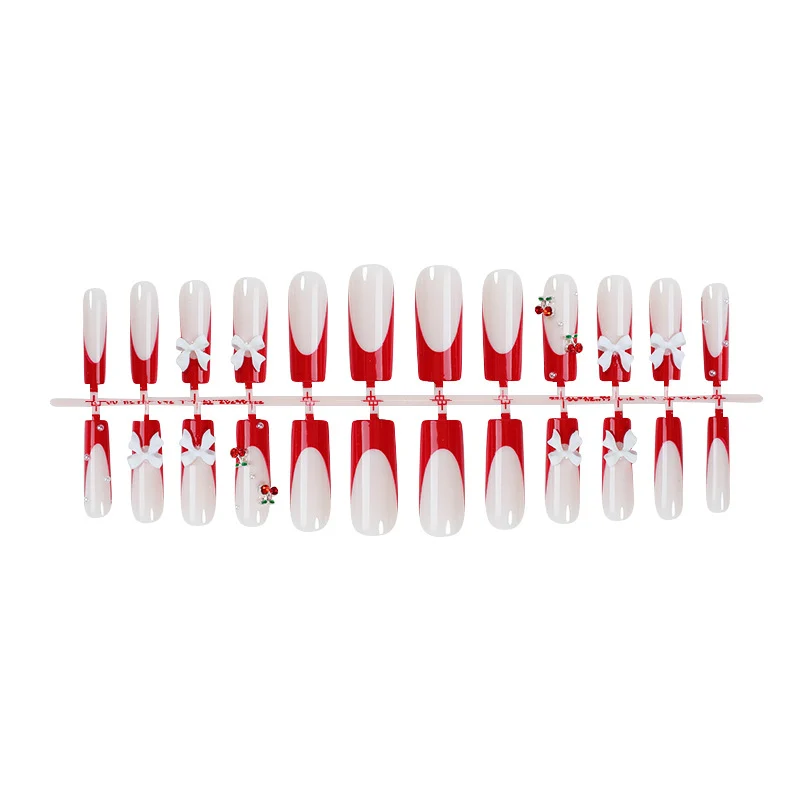Kreatives Nagelset mit festlichen Kirschmotiven Karnz