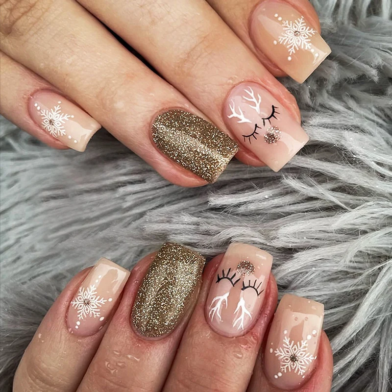 Kreatives Kunstnagelset mit winterlichen Motiv- und Glitzereffekten Karnz