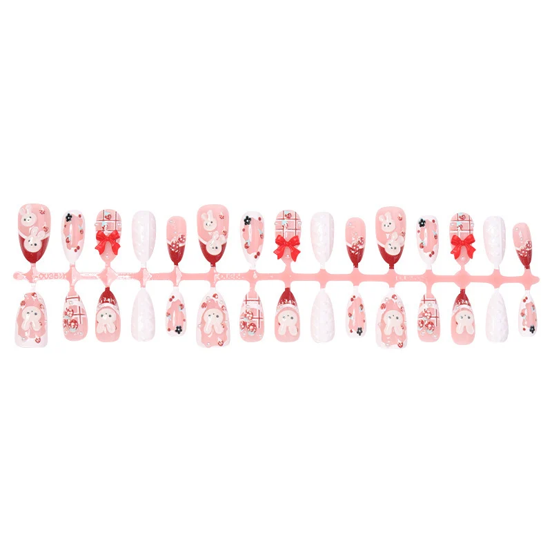 Kreatives Kunstnagelset mit verspielten Bunny- und Geschenkdesigns Karnz