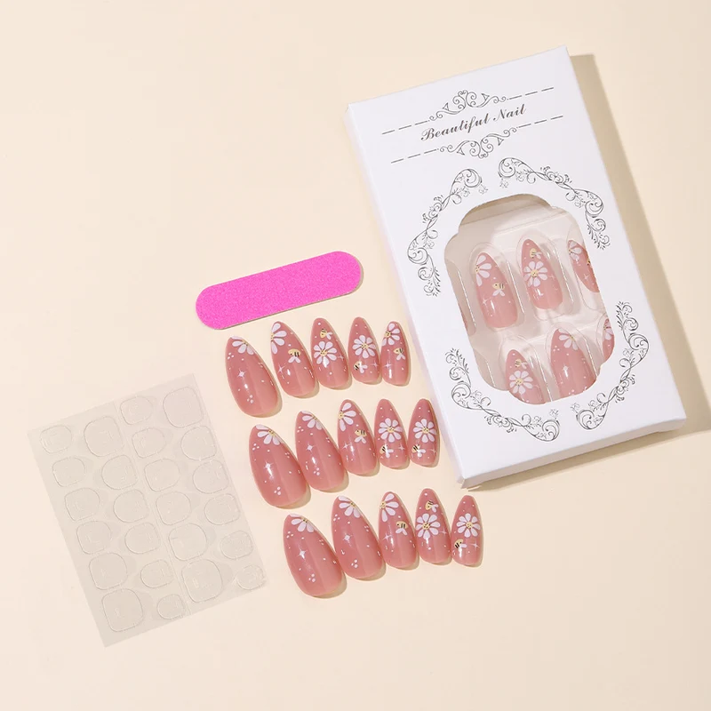 Kunstnägel Set mit eleganten Blüten und Glitzerakzenten Karnz