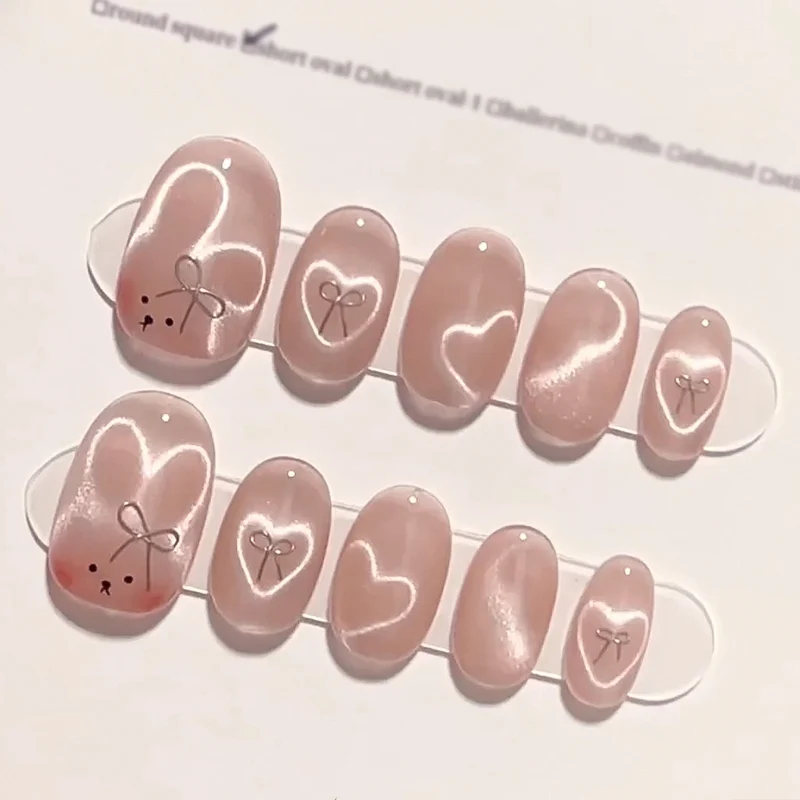 Künstliche Nagelverlängerungen mit niedlichem Hasen-Design und Herzen Karnz